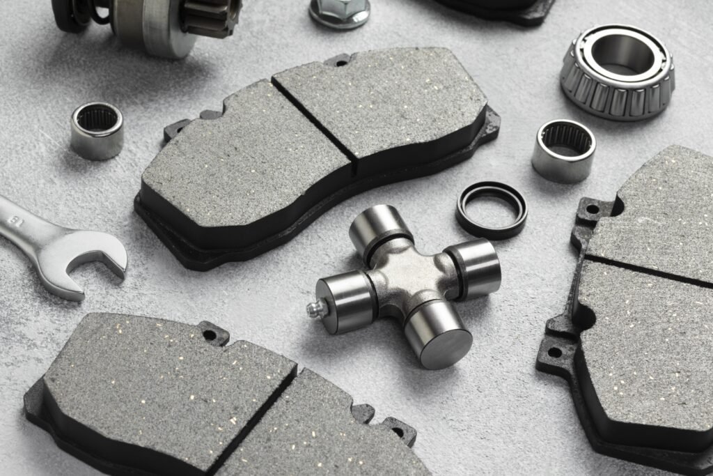 Measuring brake pad thickness with a digital caliper after removing wheel