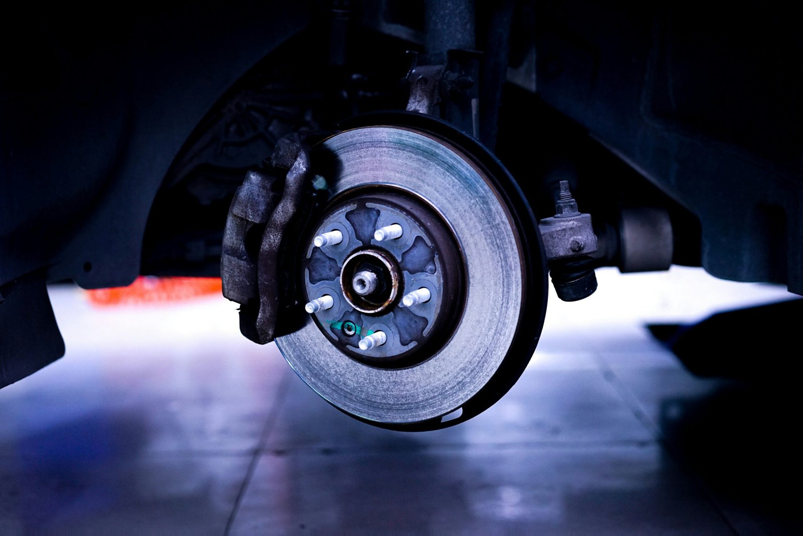 How to check brake pads through wheel spokes using a flashlight